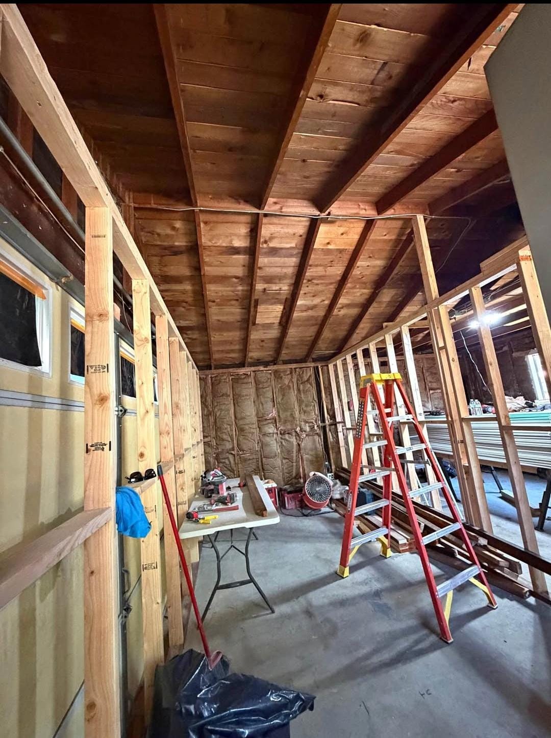 Garage being framed for conversion into a living space