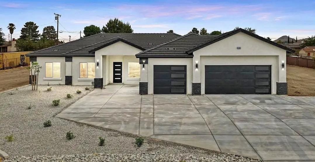 Newly built single-story home with a three-car garage in Southern California